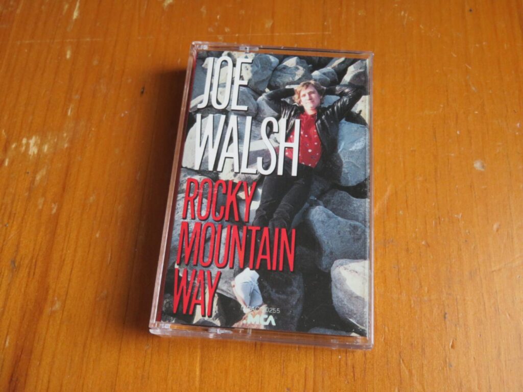 ジョー・ウォルシュ『ロッキー・マウンテン・ウェイ』（1985）のカセットテープ。